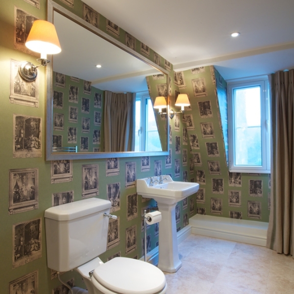 Statement wallpaper in the refurbished cloakroom