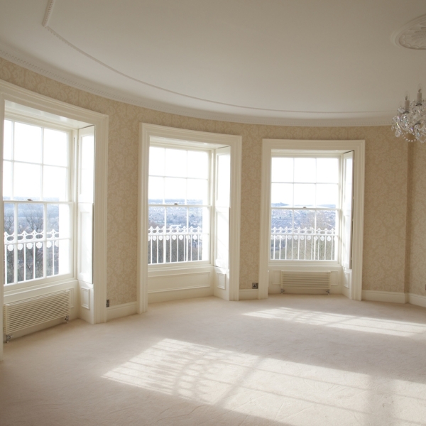 Light and airy drawing room with shuttered windows
